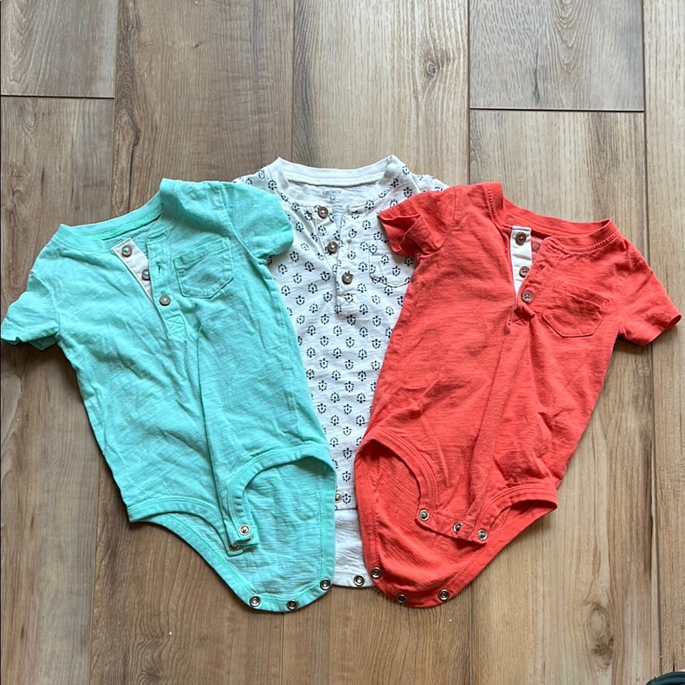 Set of Three Carter’s 12 Month Baby Bodysuits in Red, Blue, and White
